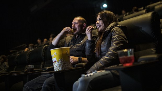 Ekrem Karakos and Alev Babayigit enjoy a move in cinemas on Friday. 