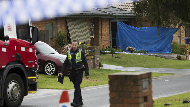Police at the scene after a woman's body was found following a house fire in Maria Court, Cranbourne North.