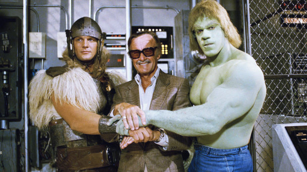 Stan Lee, centre, poses with Lou Ferrigno, right, and Eric Kramer who portray 'The Incredible Hulk' and Thor, respectively, 1988.