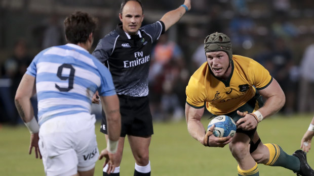 On the charge: David Pocock carries for the Wallabies in Argentina.