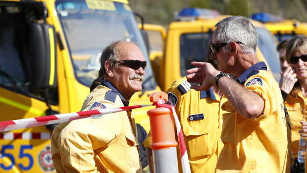 Fire and Emergency crews from New South Wales prepare to join their Queensland counterparts in the ongoing bushfire control effort near the rural town of Canungra in the Scenic Rim region.