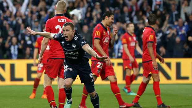 On target: Besart Berisha wheels away in delight after putting Victory 2-1 up against Adelaide in the 89th minute of the A-League elimination final at AAMI Park.