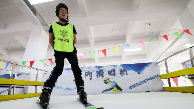 Workers test the ski simulator at the Zhangjiakou Ice and Snow Sports Equipment Park in Zhangjiakou, China. 