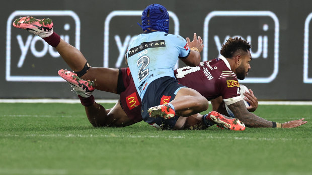 Hamiso Tabuai-Fidow scores a try during game two of the men’s State of Origin series.