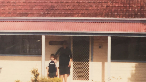 Historic photo of Ruben Mackellar (left) with older brother Thomas out the front of the family holiday house at Nambucca Heads. 