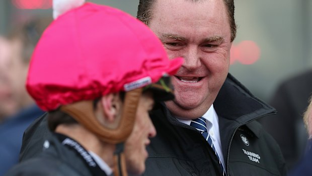 Morrissy trainer Troy Corstens with jockey Craig Williams after his win on the promising colt.