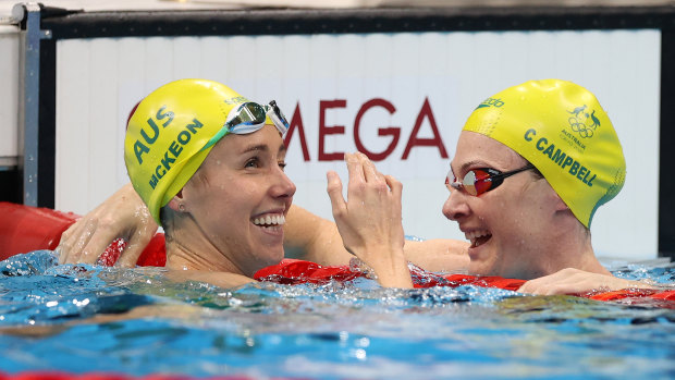 Emma McKeon celebrates with teammate Cate Campbell after winning the women’s 50m freestyle final.