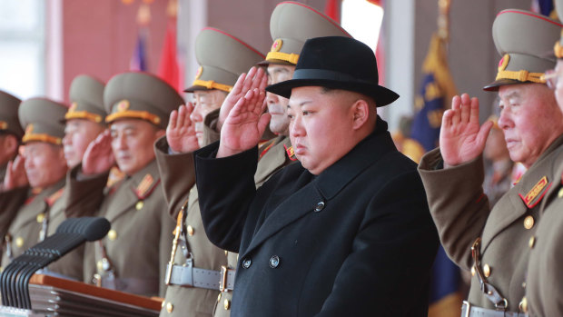 Kim Jong-un watches a military parade in North Korea.