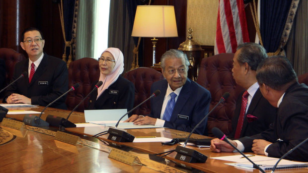 Malaysian Prime Minister Mahathir Mohamad, centre, chairs his first cabinet meeting last week.