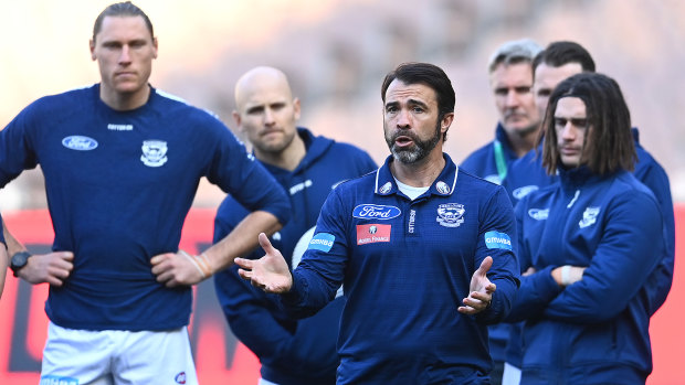 Pep talk: Cats coach Chris Scott speaks to his players during the round 4 clash against the Demons at the MCG.