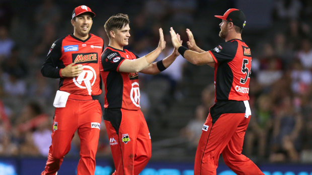 Having a ball: Leg-spinner Cameron Boyce (middle) celebrates a wicket for the Renegades.