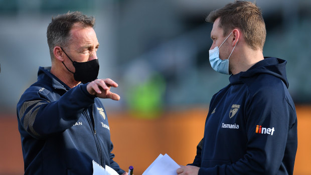 Alastair Clarkson and Sam Mitchell during the Hawks’ clash with the Lions.