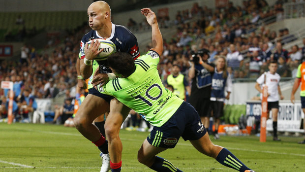 Bill Meakes powers through for what would be the Rebels' match-winning try on Friday night at AAMI Park.