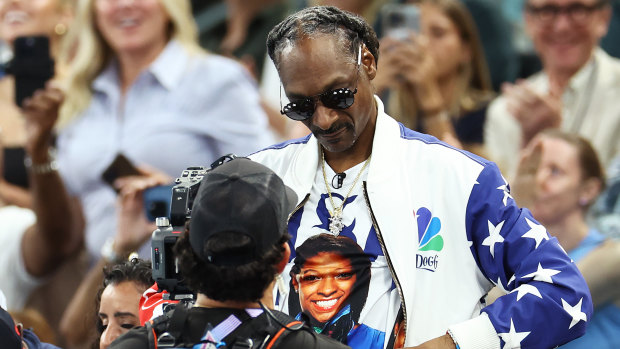 US rapper Snoop Dogg wears a Simone Biles shirt while attending the women’s artistic gymnastics qualifications.