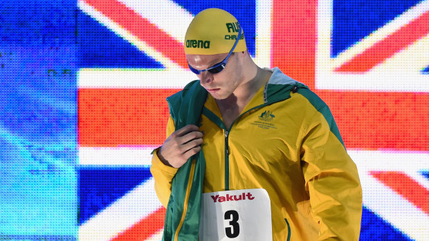 Focused: Kyle Chalmers walks onto the pool deck before winning the men's 100m freestyle final at the Pan Pacs.