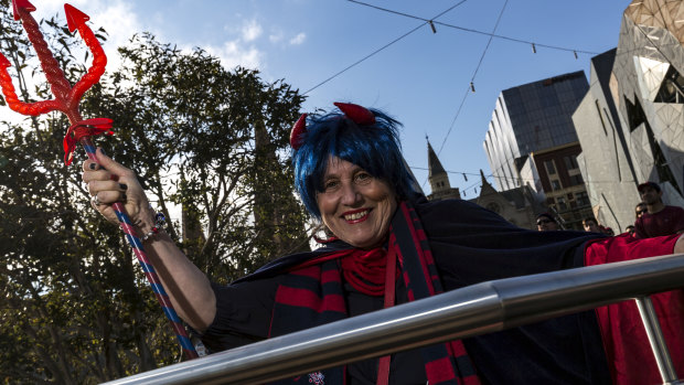 Jan Armstrong, who has followed the Dees for more than 50 years, joined hundreds of Melbourne supporters at Federation Square.