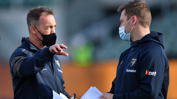 Alastair Clarkson and Sam Mitchell during the Hawks’ clash with the Lions.