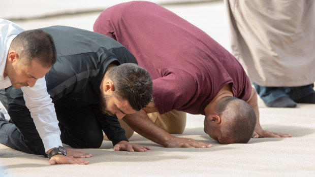 Mundine was one of many who joined the Friday prayers outside the Al Noor mosque.