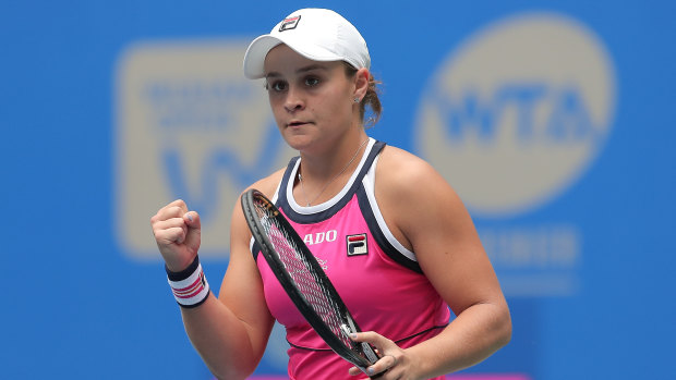 Ashleigh Barty has ensured she will retain the world's top ranking after reaching the Wuhan quarter-finals.