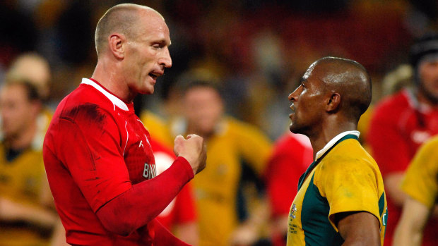 Gareth Thomas, seen with former Wallabies captain George Gregan in their playing days, has revealed he has HIV.