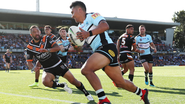 Sosaia Feki scores as Cronulla pile on the points in the second half.