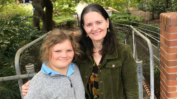 Alison Courtice from Queensland Parents for Secular State Schools, pictured with her daughter Lauren, calls for religious instruction courses to be replaced by studies of the world's religions. 
