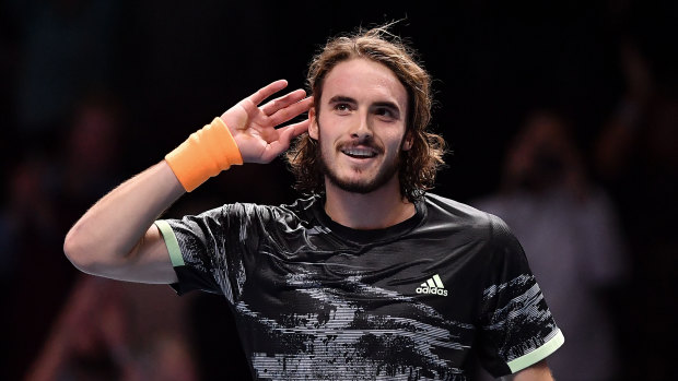 Stefanos Tsitsipas of Greece celebrates defeating Roger Federer at the ATP World Tour Finals in London.