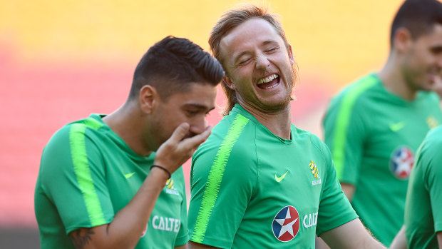 Fresh face: Rhyan Grant enjoys a joke during a Socceroos training session in Brisbane.