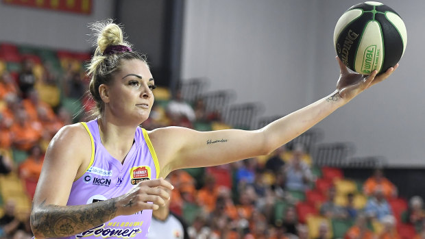 Cayla George of the Boomers takes possession during the round five match against Townsville Fire on Sunday.