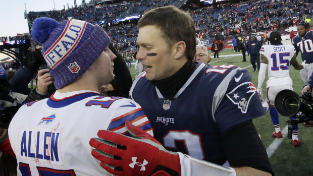 Clinched: Buffalo quarterback Josh Allen congratulates Tom Brady after the Patriots' play-off clinching win.