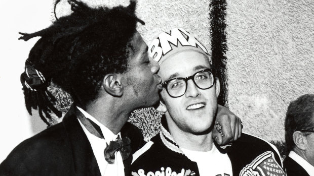 Jean-Michel Basquiat, left, and Keith Haring at the opening reception for Julian Schnabel at the Whitney Museum of American Art, New York, 1987. 