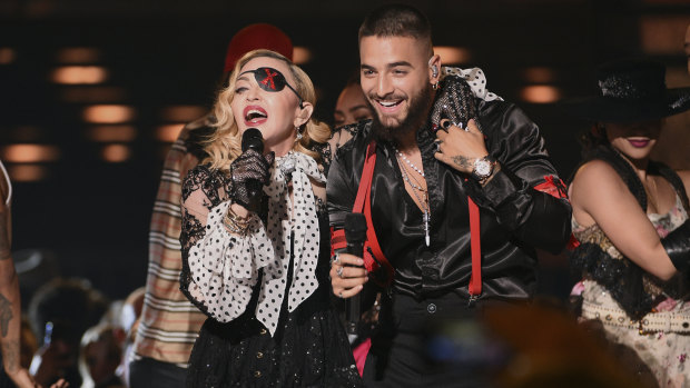 Madonna performs with Maluma.