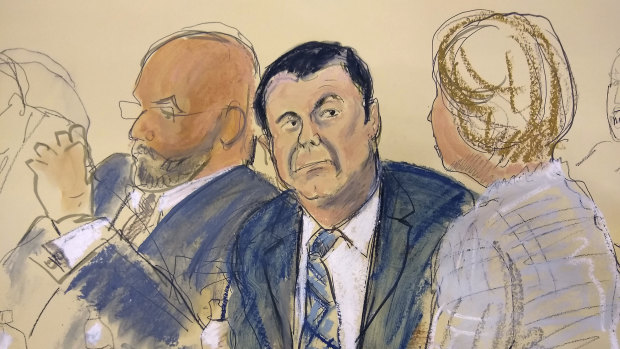  In this courtroom sketch El Chapo, centre, sits next to his defence attorney Eduardo Balarezo, left, for opening statements on the first day of his trial.