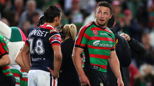 Sam Burgess exchanges words with Billy Smith on Thursday night.