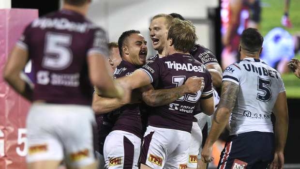 The Sea Eagles celebrate another try.