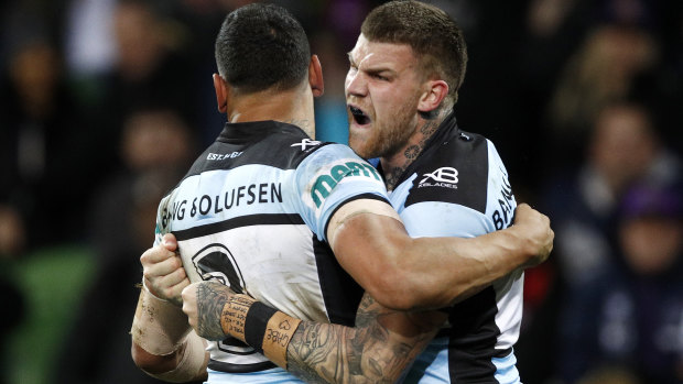 Shark attack: Josh Dugan (right) and Jesse Ramien celebrate a try in Melbourne.