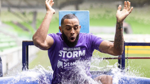 Storm's Josh Addo-Carr takes his chances on the Big Purple Splash dunk machine at AAMI Park on Wednesday.