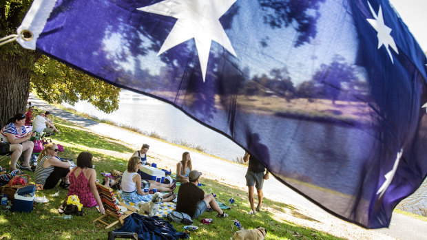 Melburnians celebrating Australia Day with a picnic on the banks of the Yarra.