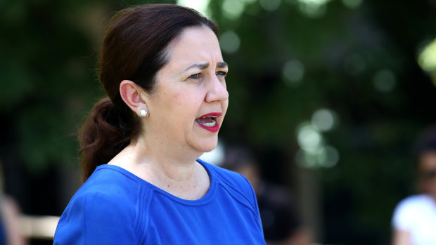 Premier Annastacia Palaszczuk speaks to the media at the University of Queensland on Sunday.