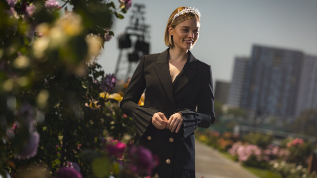 Actress Bella Heathcote, who will be a special guest of the Victoria Racing Club on Derby Day, with Flemington's famous roses.