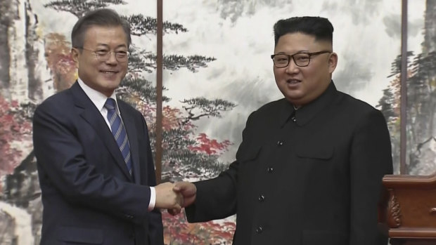 Unified: North Korean leader Kim Jong Un (right) and South Korean president Moon Jae-in shake hands at the end of their joint press conference in Pyongyang.