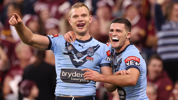 Tom Trbojevic and Nathan Cleary celebrate a try in Origin I. They have surpassed James Tedesco as the best players in the game.