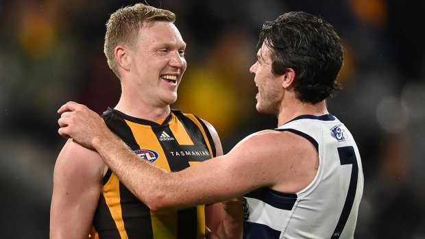 James Sicily and Isaac Smith shake hands after the Easter Monday blockbuster at the MCG.