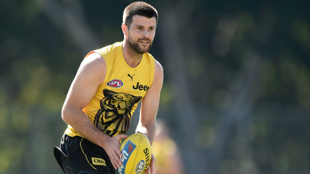 Toil and trouble: Trent Cotchin in training with the Tigers at the Gold Coast hub.