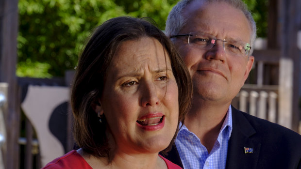 Kelly O'Dwyer announces her decision to quit politics alongside a supportive Scott Morrison.