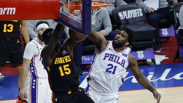 Hawks big man Clint Capela dunks over Philadelphia opponent, and the NBA’s MVP runner-up, Joel Embiid.
