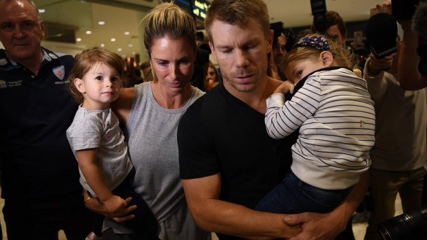 David and Candice Warner at Sydney Airport in March. 