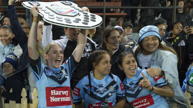 The Blues are presented with the Women's State of Origin shield.