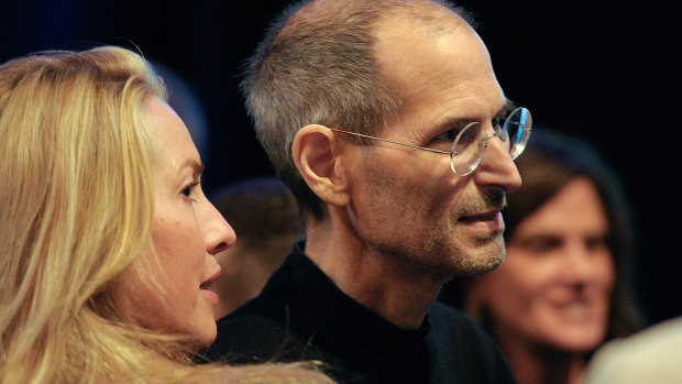 Laurene Powell Jobs with her late husband Steve Jobs in 2011. 