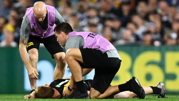 Nick Vlastuin was left concussed and took no further part in the grand final after a collision with Patrick Dangerfield.